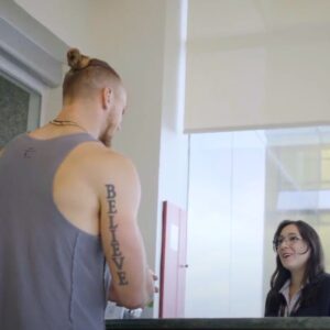 George Kittle at the Stem Cell Institute front desk