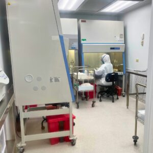 Lab Technician prepares syringes for patients in our clinic's GMP cleanroom after cell vials arrived from Medistem’s production lab