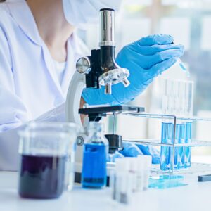 stem cell researcher examining a test tube