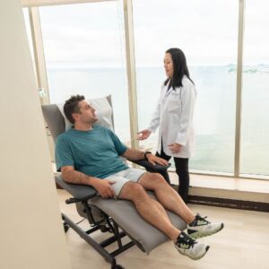 doctor discussing how much do stem cell injections cost with a patient